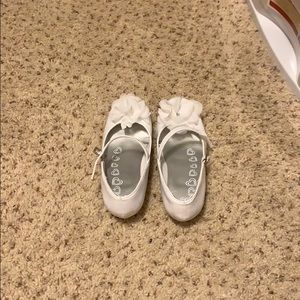 These are white high heeled shoes.